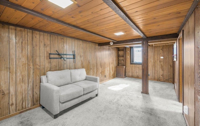 unfurnished room with wood ceiling, light carpet, and wood walls