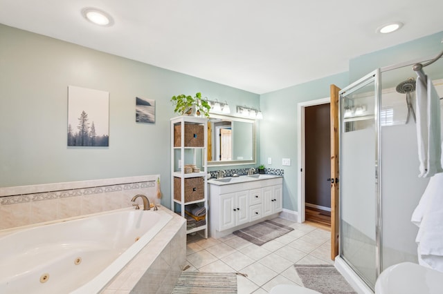 full bath featuring recessed lighting, a stall shower, vanity, tile patterned flooring, and a jetted tub