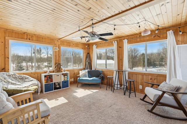 sunroom featuring wood ceiling