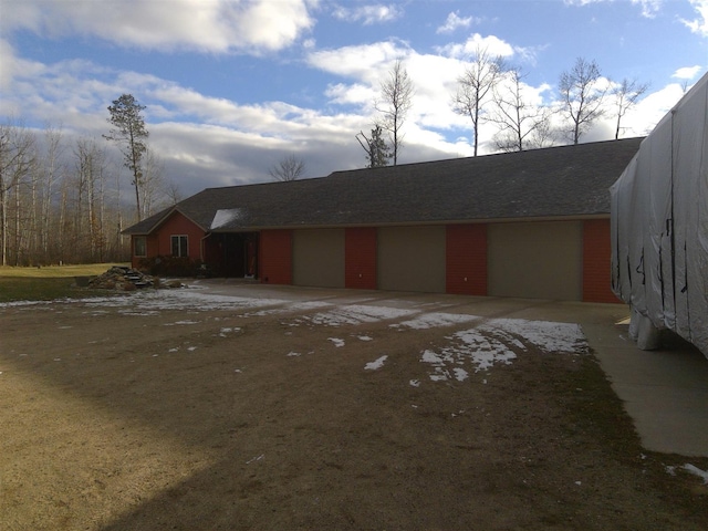 view of front of home with a garage