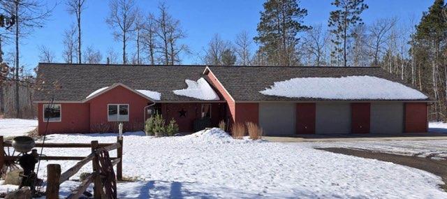 single story home with a garage