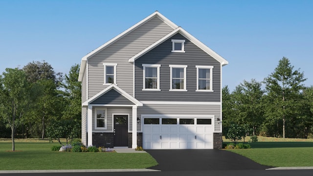 view of front of property featuring a garage and a front yard