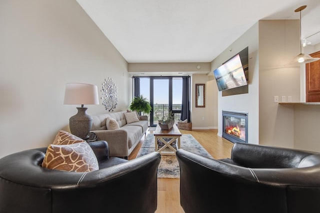 living room with light hardwood / wood-style floors