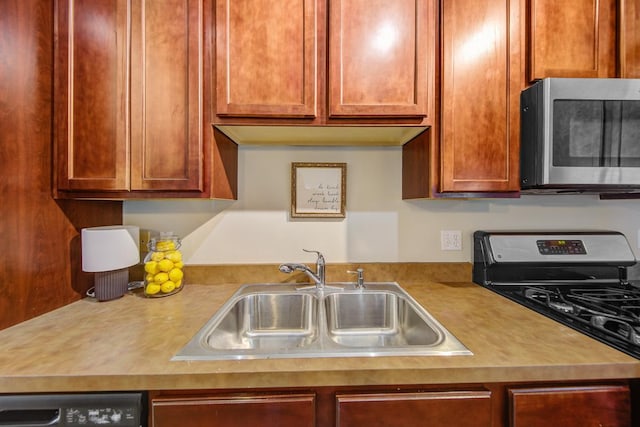 kitchen featuring sink and appliances with stainless steel finishes