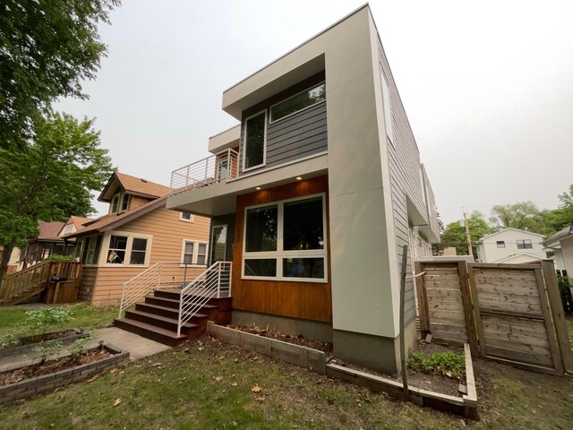 1447 Juliet Ave, Saint Paul, MN 55105 - rear view of house featuring a balcony