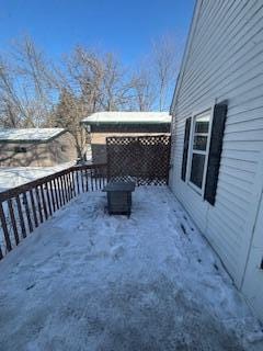 view of snow covered deck