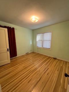 empty room featuring light wood-style floors