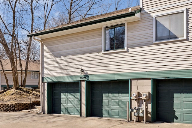 exterior space with a garage