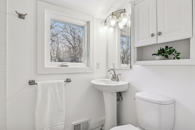 bathroom with sink and toilet