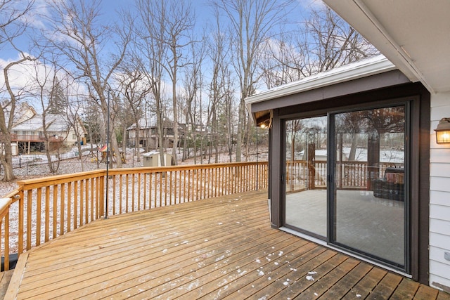 view of snow covered deck