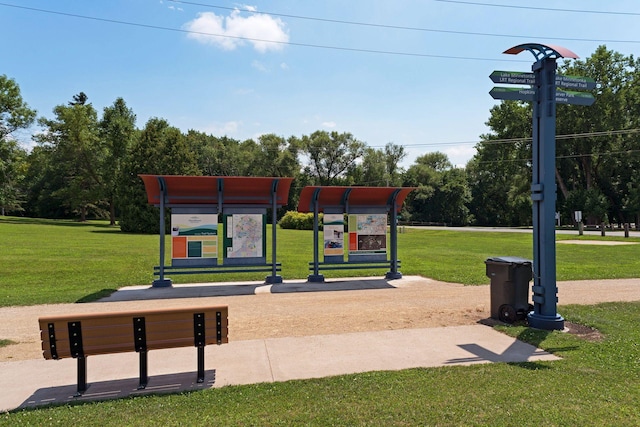 surrounding community featuring a yard and a playground