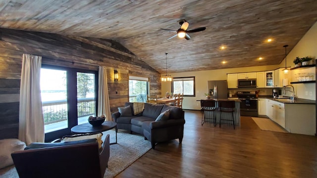 living room with dark wood finished floors, a ceiling fan, wooden ceiling, vaulted ceiling, and recessed lighting