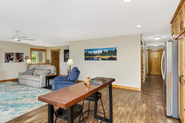 interior space featuring dark hardwood / wood-style floors and ceiling fan