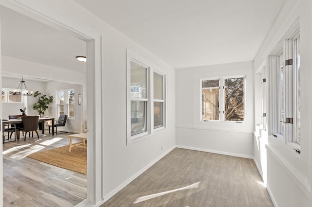 interior space with an inviting chandelier