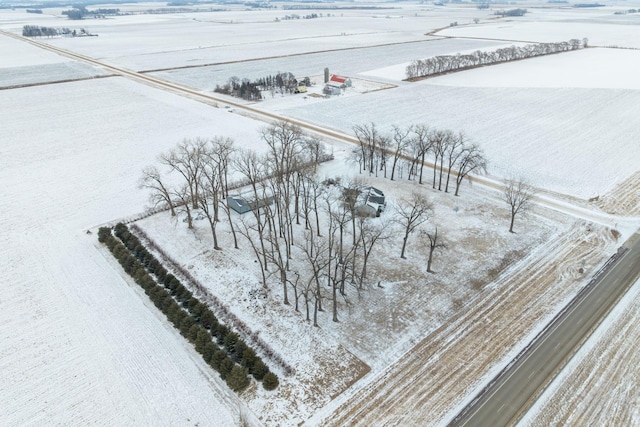 snowy aerial view with a rural view