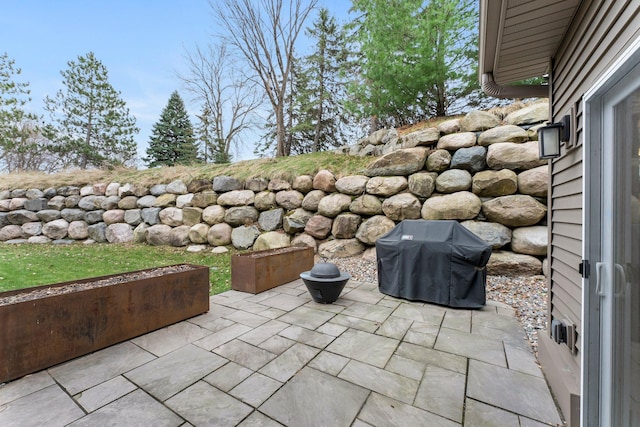 view of patio featuring a grill