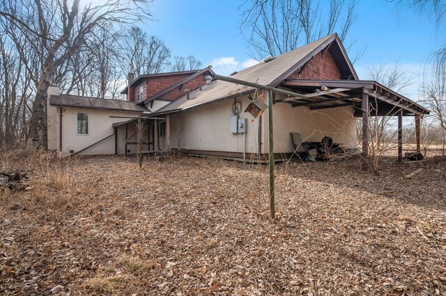 view of home's exterior featuring a chimney