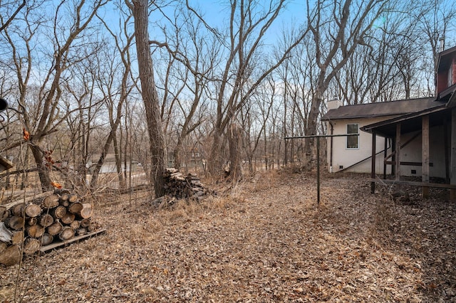 view of yard featuring a sunroom