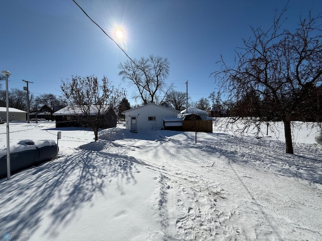 view of yard covered in snow