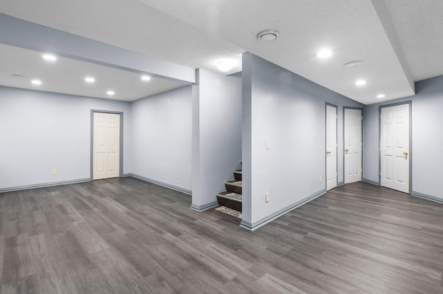 basement featuring hardwood / wood-style flooring