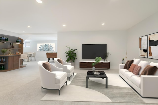 living area featuring recessed lighting and light colored carpet