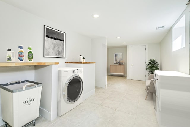 laundry room featuring visible vents, washer / dryer, laundry area, light tile patterned flooring, and recessed lighting