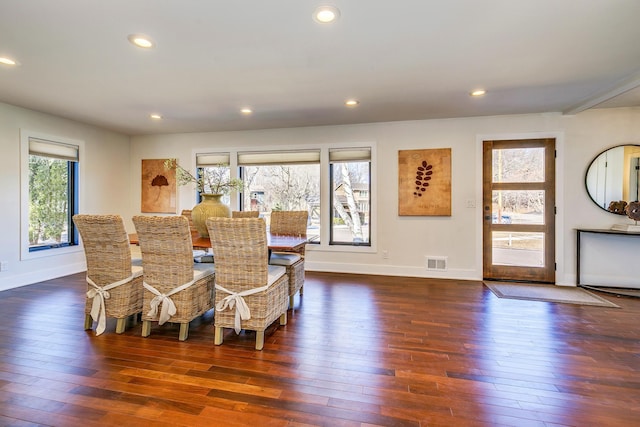 dining area with visible vents, recessed lighting, baseboards, and hardwood / wood-style flooring