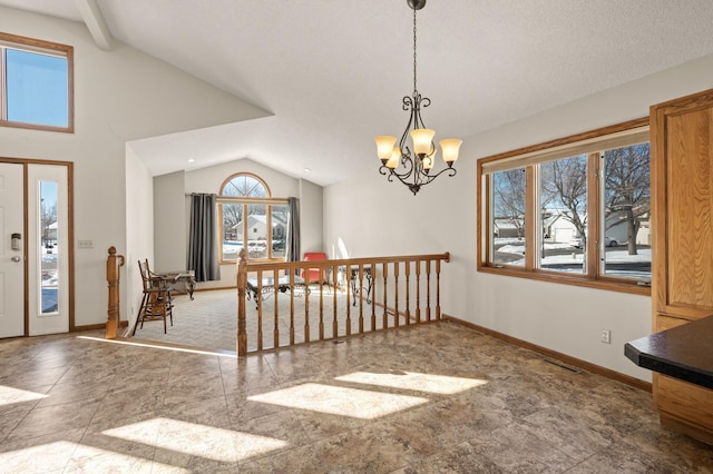 carpeted foyer entrance featuring vaulted ceiling, a notable chandelier, visible vents, and baseboards