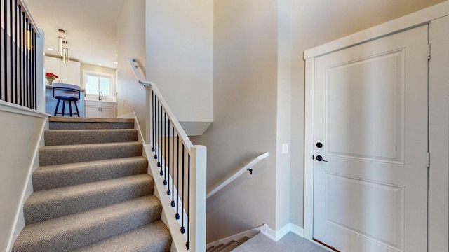 staircase with sink