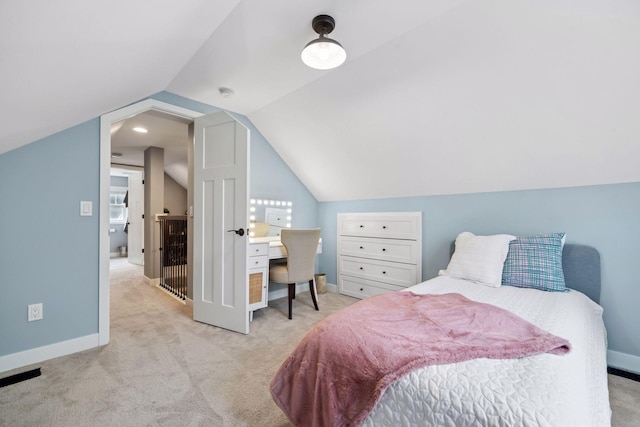 bedroom featuring lofted ceiling, carpet flooring, visible vents, and baseboards