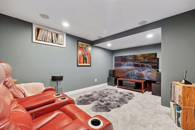 carpeted cinema with baseboards and recessed lighting