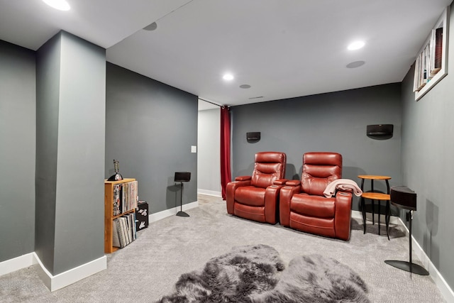 carpeted cinema with recessed lighting and baseboards