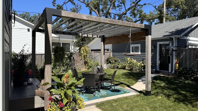 view of patio featuring fence and a pergola