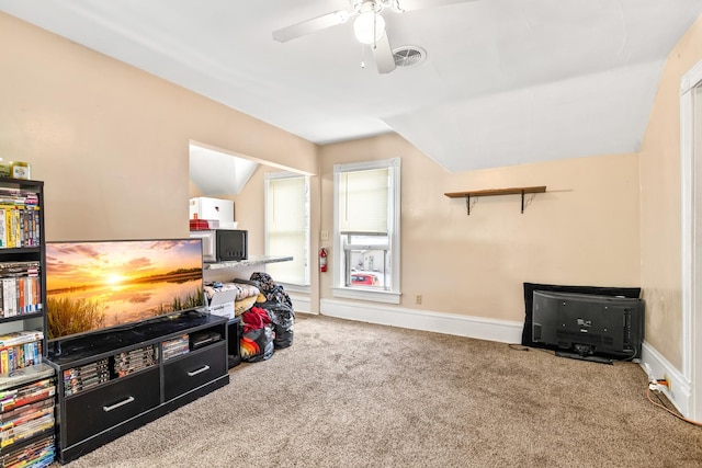 playroom with carpet flooring, vaulted ceiling, visible vents, and baseboards