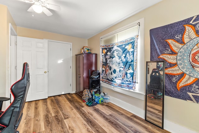 office featuring wood finished floors and baseboards