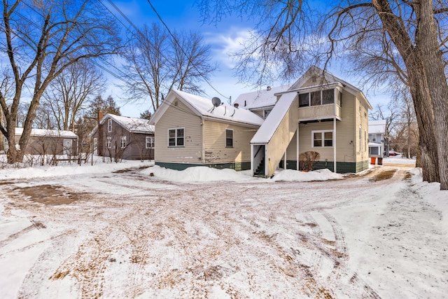 view of snow covered property