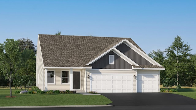 view of front of property with aphalt driveway, a garage, roof with shingles, and a front yard