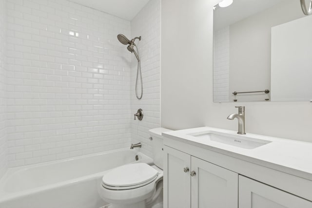 full bathroom featuring toilet, bathtub / shower combination, and vanity