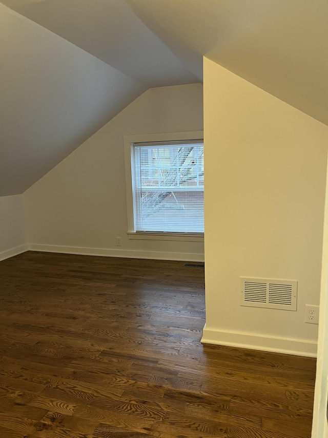 351 Morse Ave, Excelsior, MN 55331 - bonus room featuring vaulted ceiling, dark wood finished floors, and baseboards