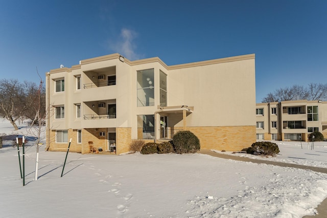 view of snow covered building