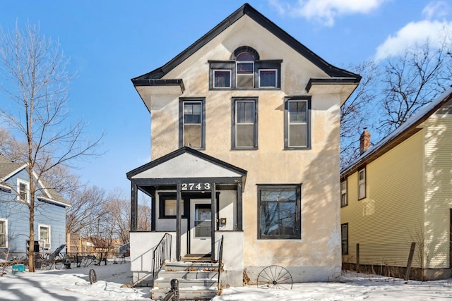 view of front of property featuring stucco siding