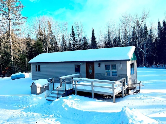 view of front of property featuring a deck