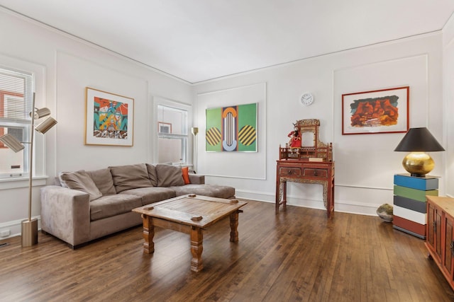 living area featuring dark wood-style floors and baseboards