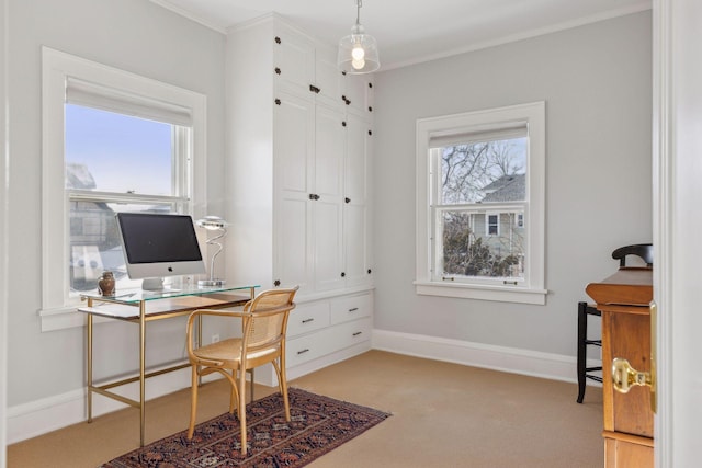 home office featuring ornamental molding, light carpet, plenty of natural light, and baseboards