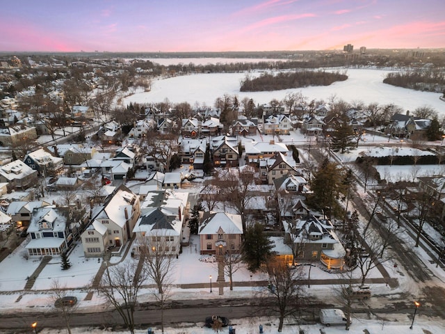 1625 25th St, Minneapolis, MN 55405 - snowy aerial view with a residential view