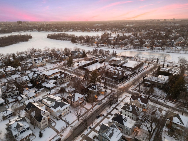 1625 25th St, Minneapolis, MN 55405 - snowy aerial view featuring a residential view