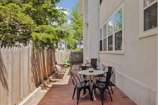 1625 25th St, Minneapolis, MN 55405 - view of patio featuring a gate