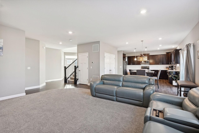 living room featuring dark hardwood / wood-style floors