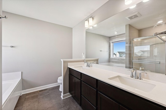 full bathroom with toilet, separate shower and tub, and vanity