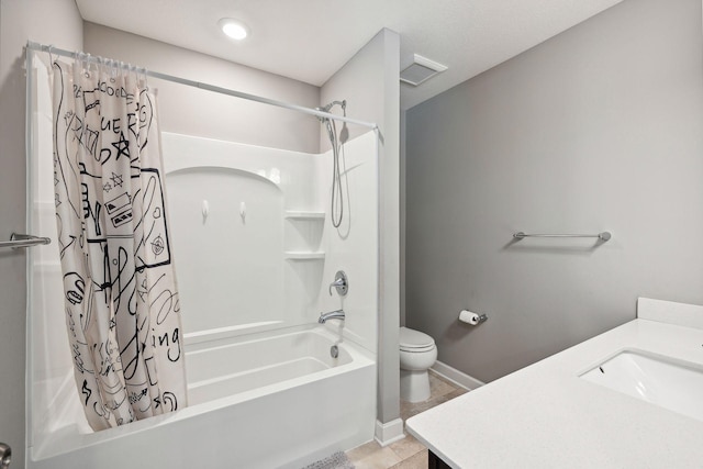 full bathroom featuring toilet, shower / bath combo with shower curtain, tile patterned flooring, and vanity